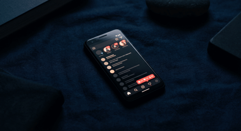 A phone showing a social media with a lot of likes, shares and conversions.